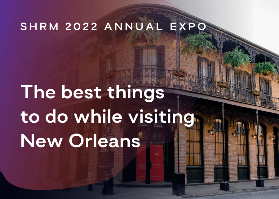 The text reads "The best things to do while visiting New Orleans" with the image of a brick two-story corner building with a red door.